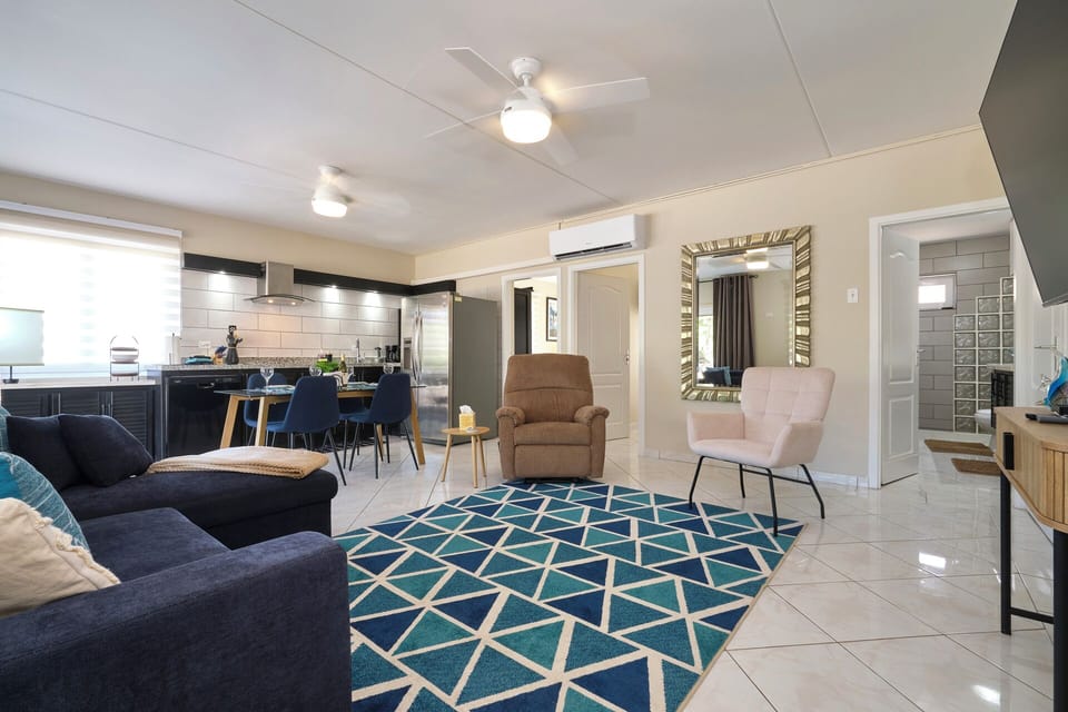 living room - with a view to 2 bedrooms and the bathroom 