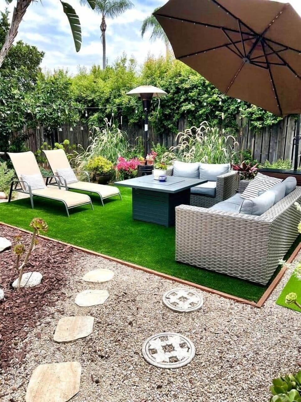 You're going to love the private oasis front yard with beverage cooler, gas fire pit in table, outdoor heater, large umbrella, and eleven places to sit and relax. 
