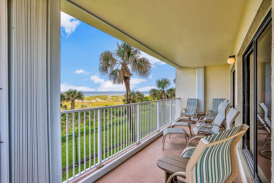 Large direct oceanfront balcony with plenty of seating