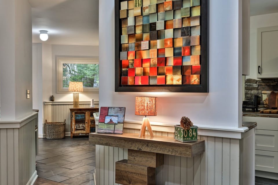 Local artistry and custom woodworking details set the tone. Not your standard rental home.