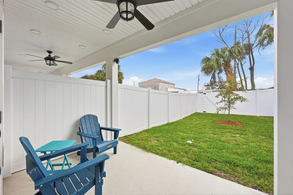 Covered backyard patio perfect for relaxing outdoors