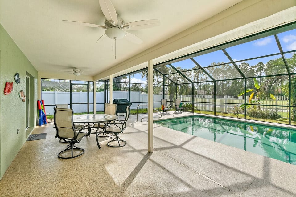 Covered lanai and pool area made for slow vacation days