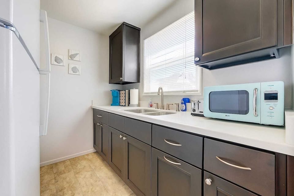 Enjoy a fully stocked kitchen, equipped with everything you need to cook and share family meals after a fun day at the beach.