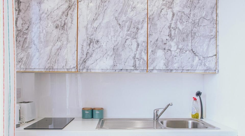 Kitchen at Avo Apartments Short Lets & Serviced Accommodation
