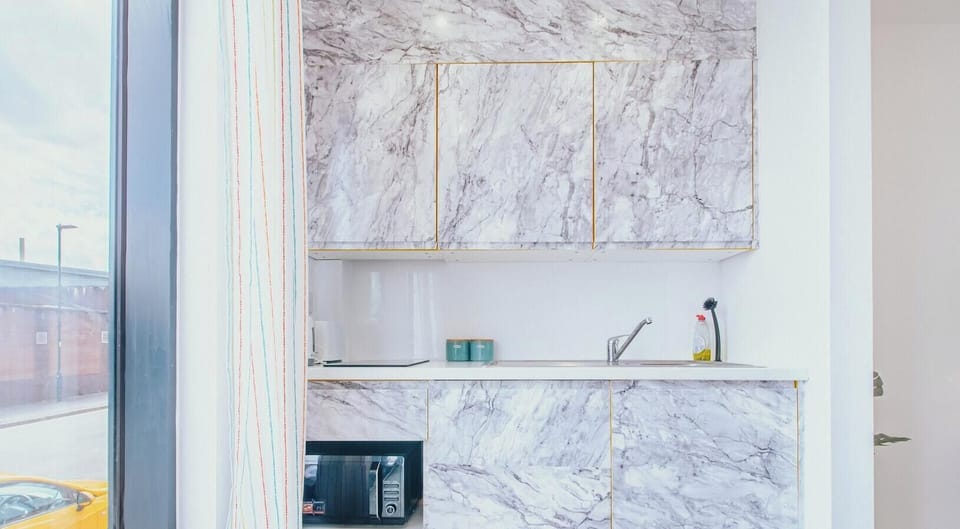 Kitchen at Avo Apartments Short Lets & Serviced Accommodation