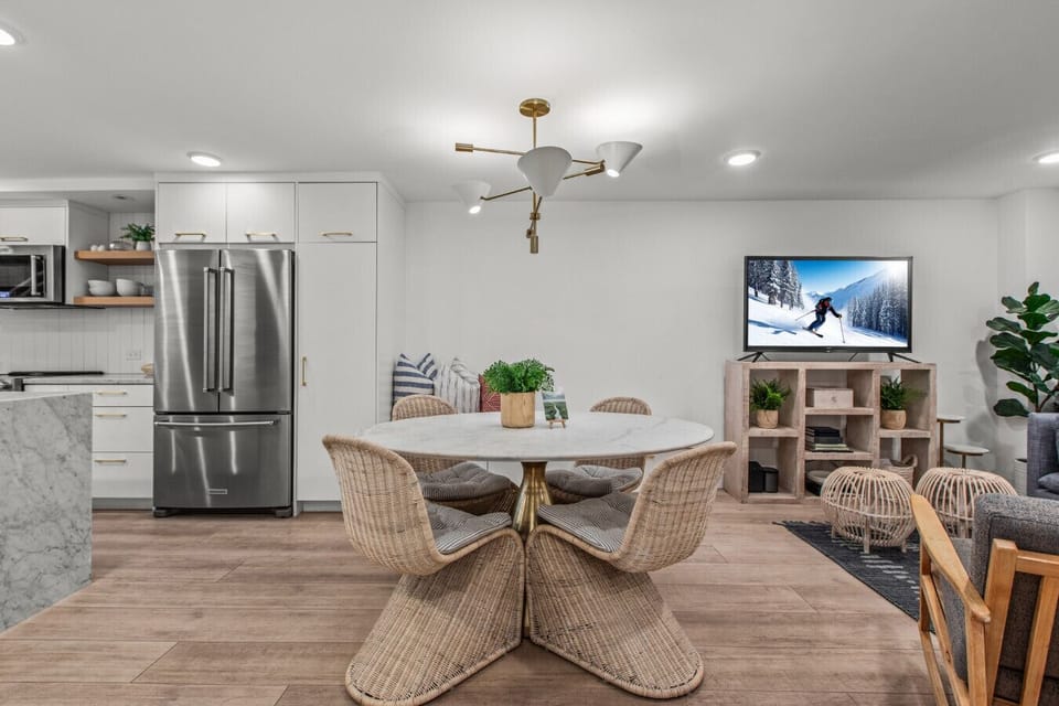 Dining table in the open layout of the condo