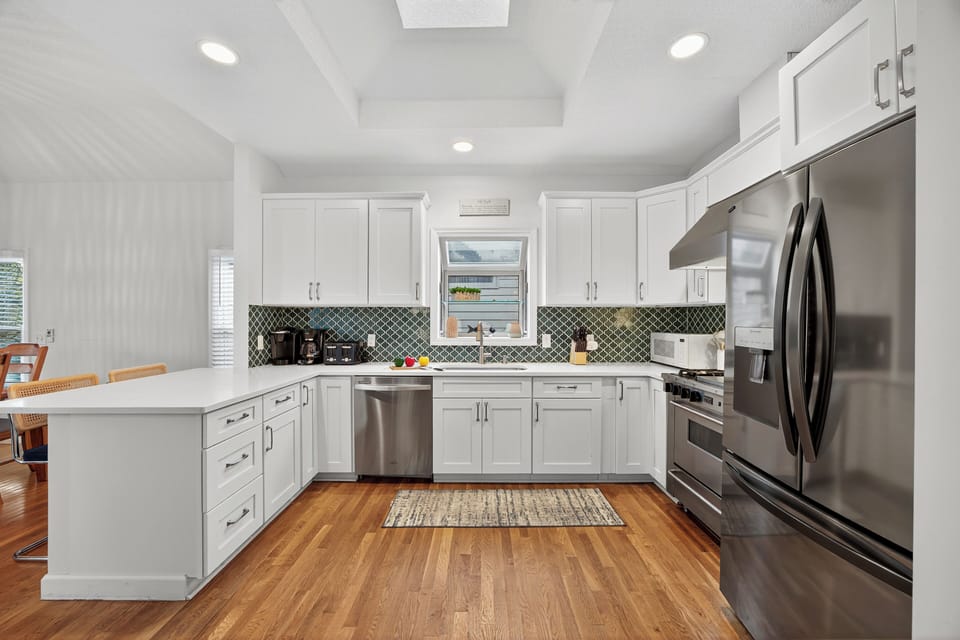 The recently remodeled kitchen highlights luxury finishes and has everything you will need to enjoy your stay from a Keurig machine, Dripp coffee maker, toaster, a gas range/oven!