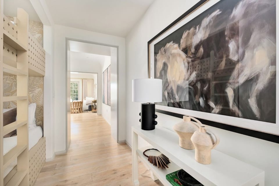Step inside to a calming gallery-style entry with curated art