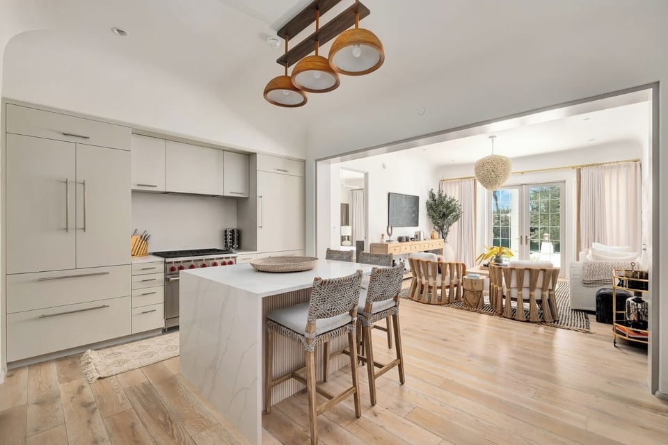 Gather and cook together around the sleek island and open plan