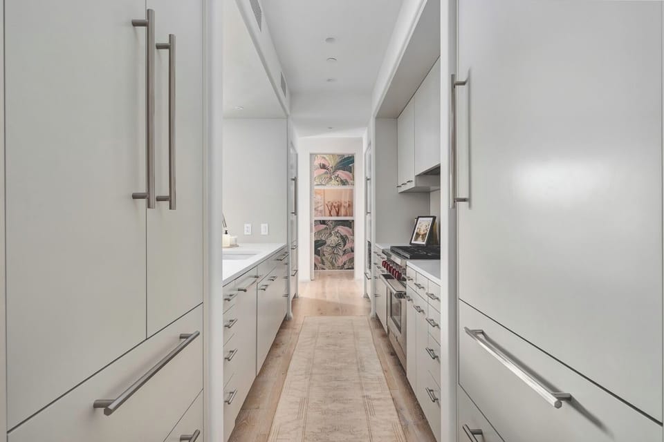 Cook with ease in the sleek galley kitchen setup.