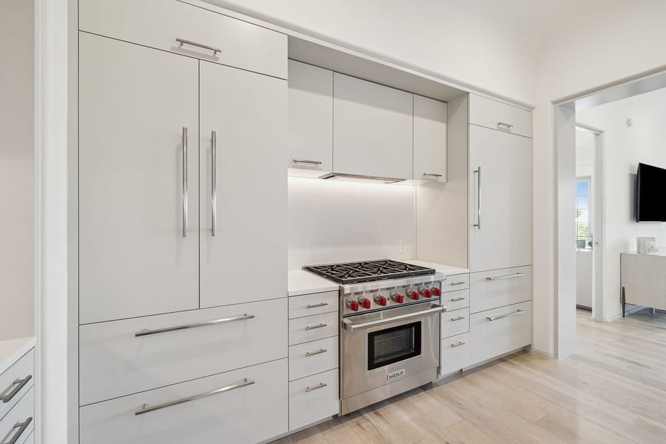 Cook gourmet meals on a sleek gas range and oven.