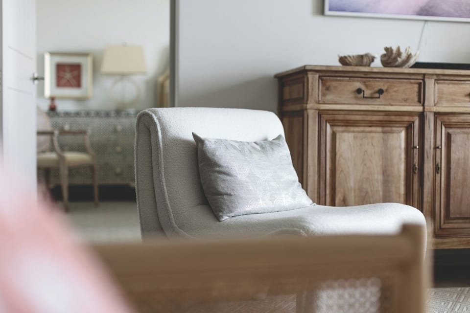 Sink into a cozy reading chair for slow, quiet mornings.