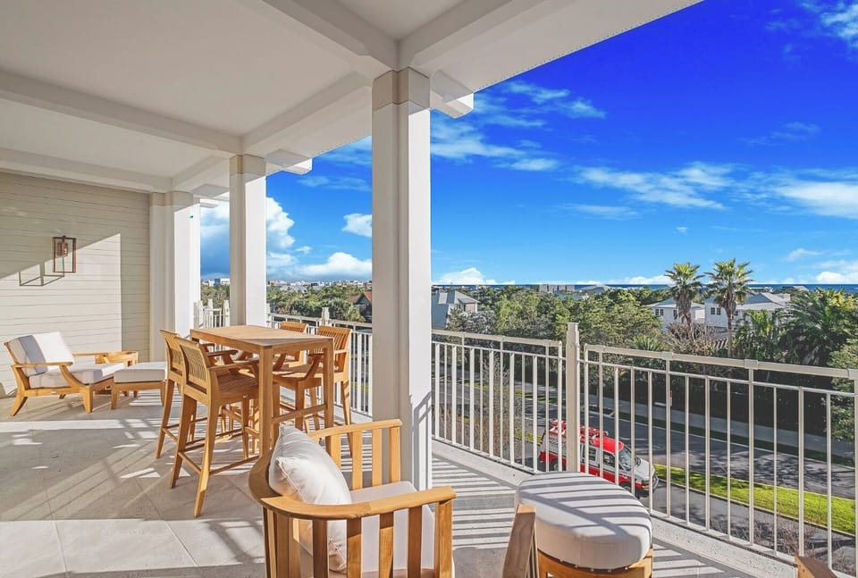 Sip morning coffee outside with breezy panoramic neighborhood views.