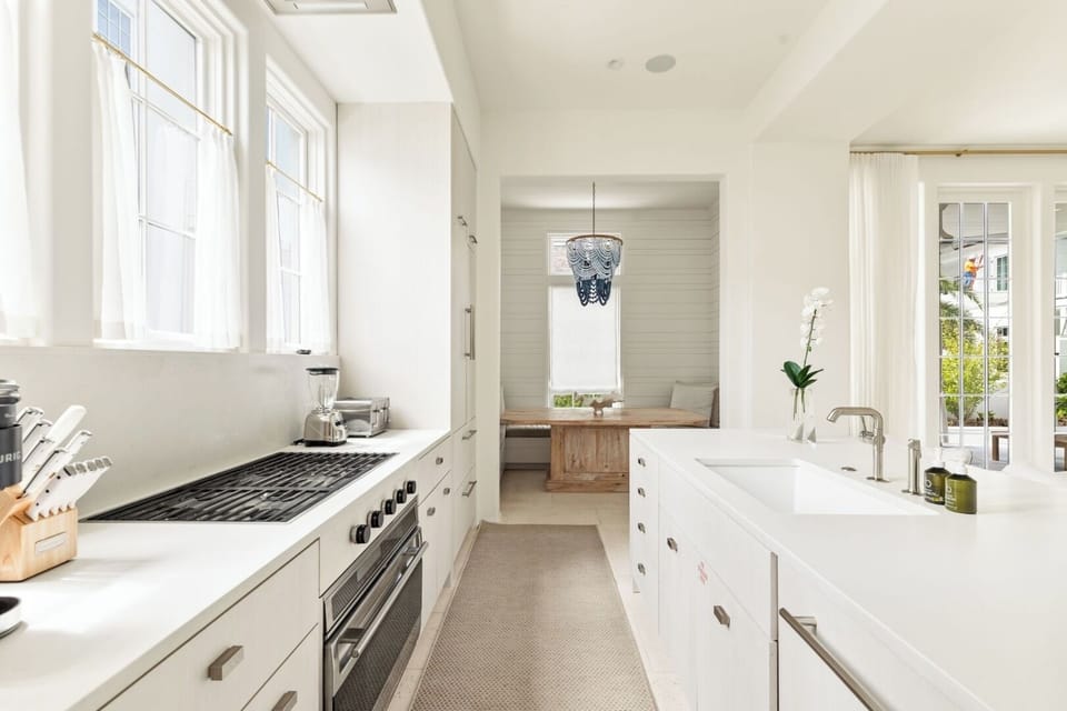Cook with ease in the sleek kitchen with gas range.