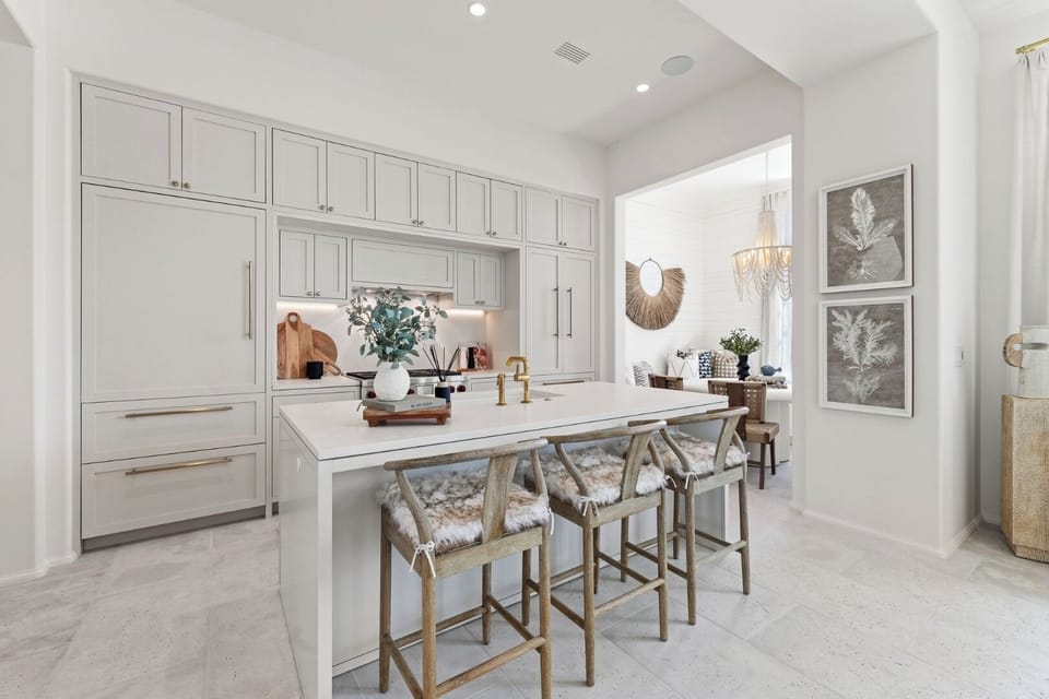 Sip coffee at the oversized island in this chef-ready kitchen.