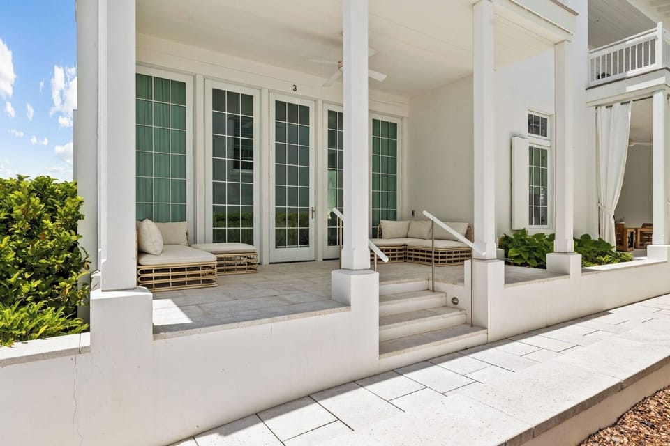 Sip morning coffee on the shaded porch steps in breezy calm.