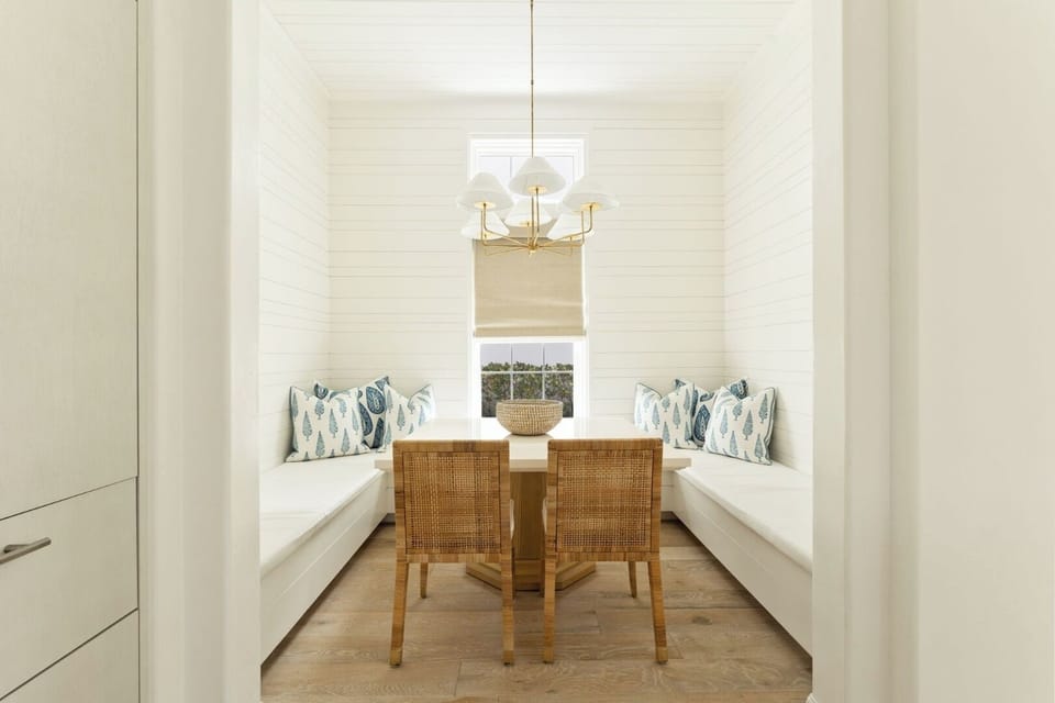 Start slow mornings in a cozy breakfast nook bathed in light.