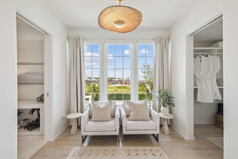 Lounge by the window with a book and soft natural light.