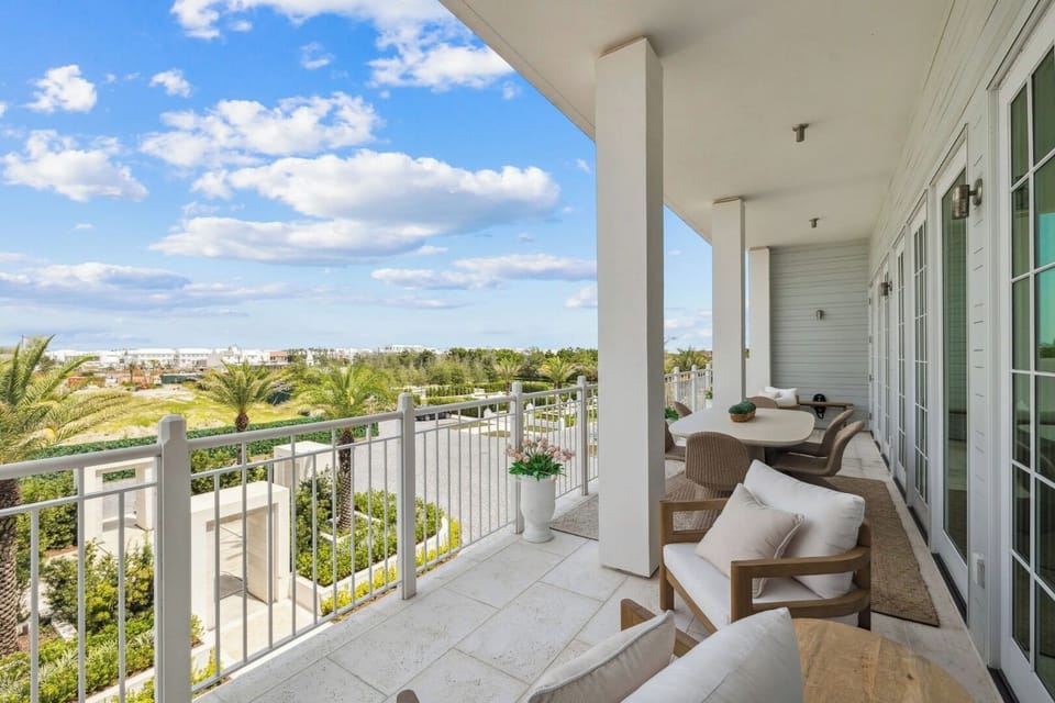 Sip morning coffee on the wide balcony with lush views.