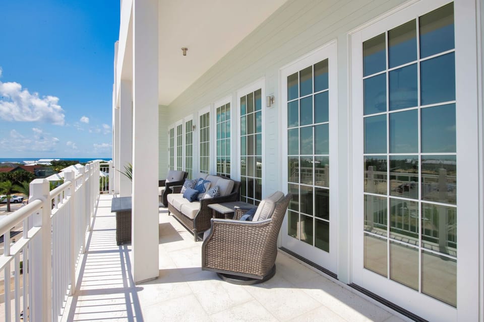 Unwind on the furnished balcony with breezy afternoon shade.