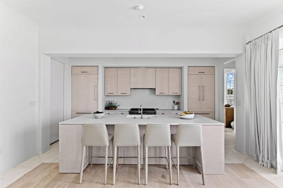 Cook with ease in the sleek kitchen and ample cabinetry.