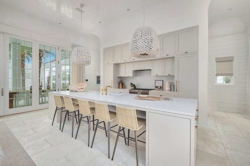 Cook and mingle around the oversized island with stylish seating.