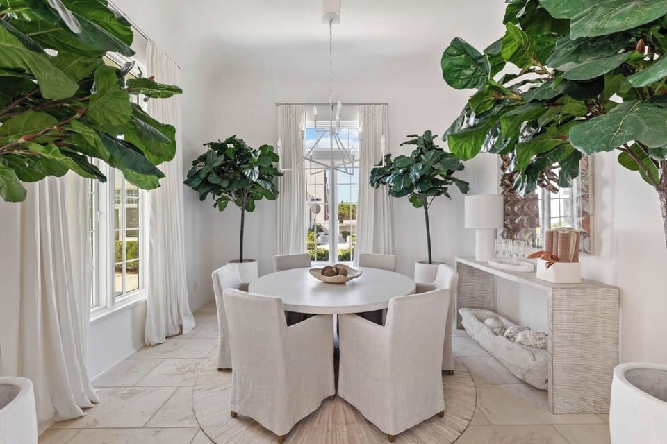 Savor slow dinners surrounded by bright, airy coastal elegance.