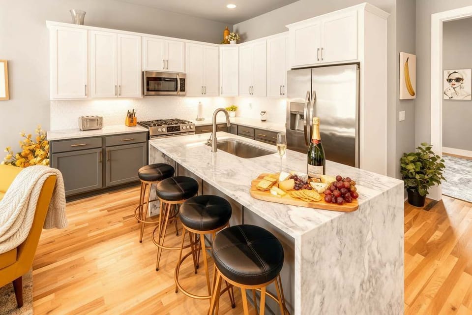 Toast a birthday or bachelorette weekend from the marble island, spread out a charcuterie board and champagne, surrounded by stainless steel and natural light
