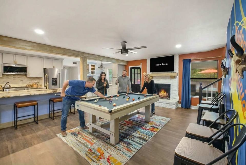 Pool table and kitchen? Now that’s what we call multitasking! Whip up a snack between turns, grab a drink mid-game, and keep the fun (and the flavors) rolling. It’s game night meets dinner party — winner eats first!