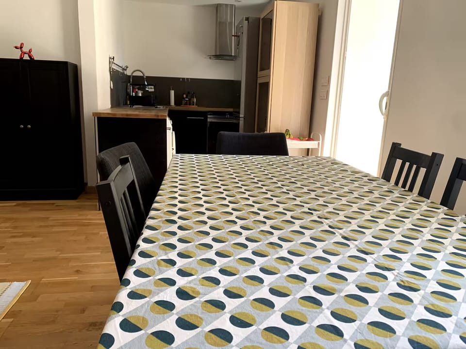 From the table towards the kitchen.