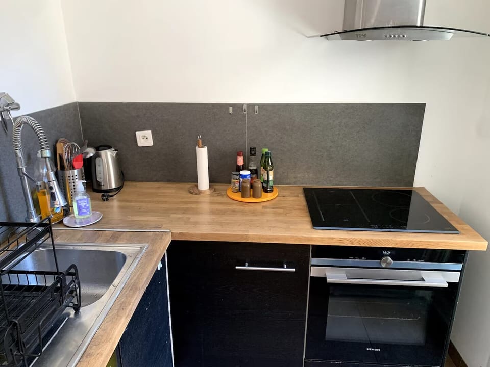 Stove, oven, sink, and storage.