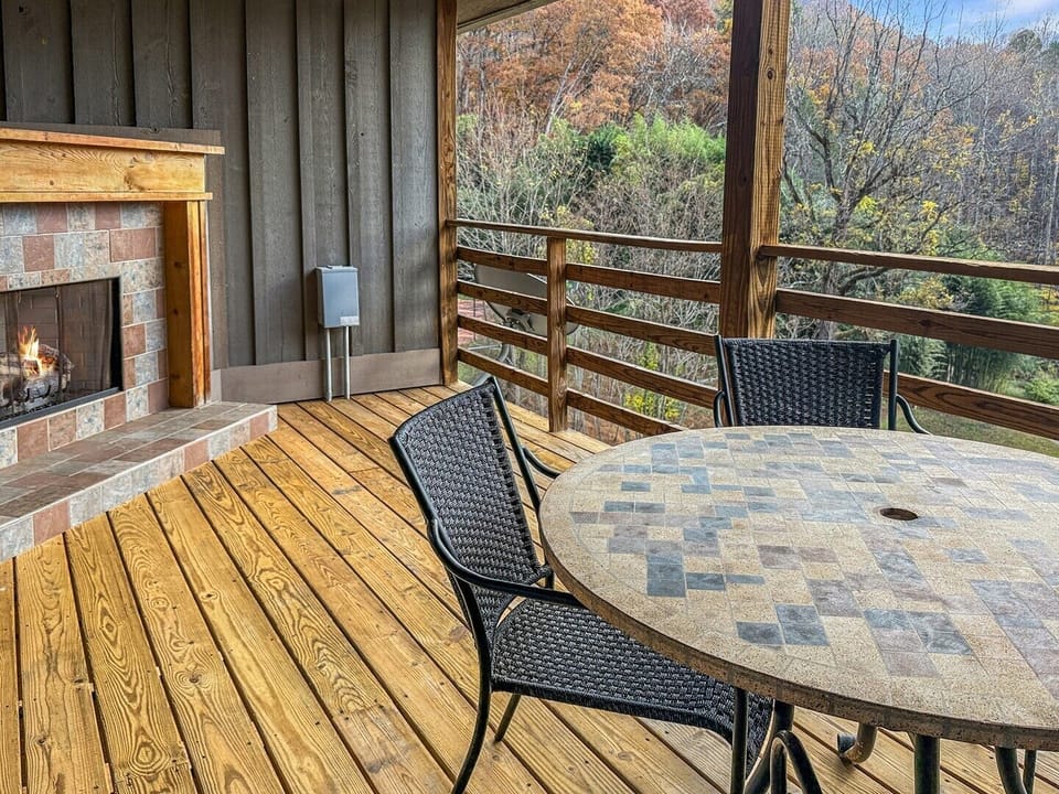 Covered Deck with Seating & Fireplace 1