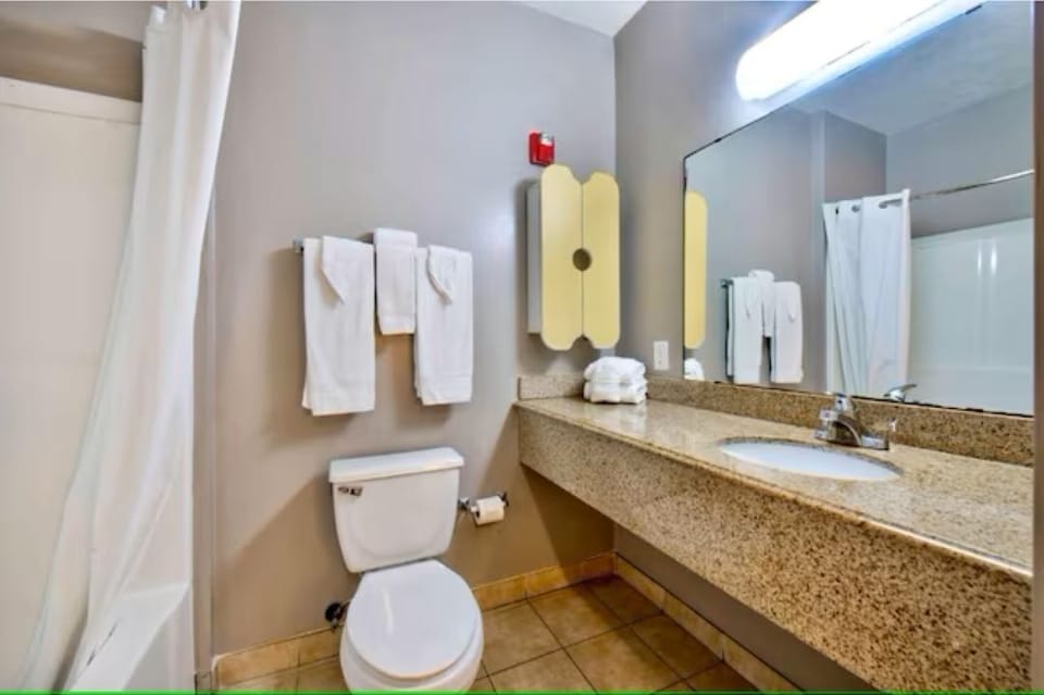 Refresh after adventures in a clean bath with ample counter space.