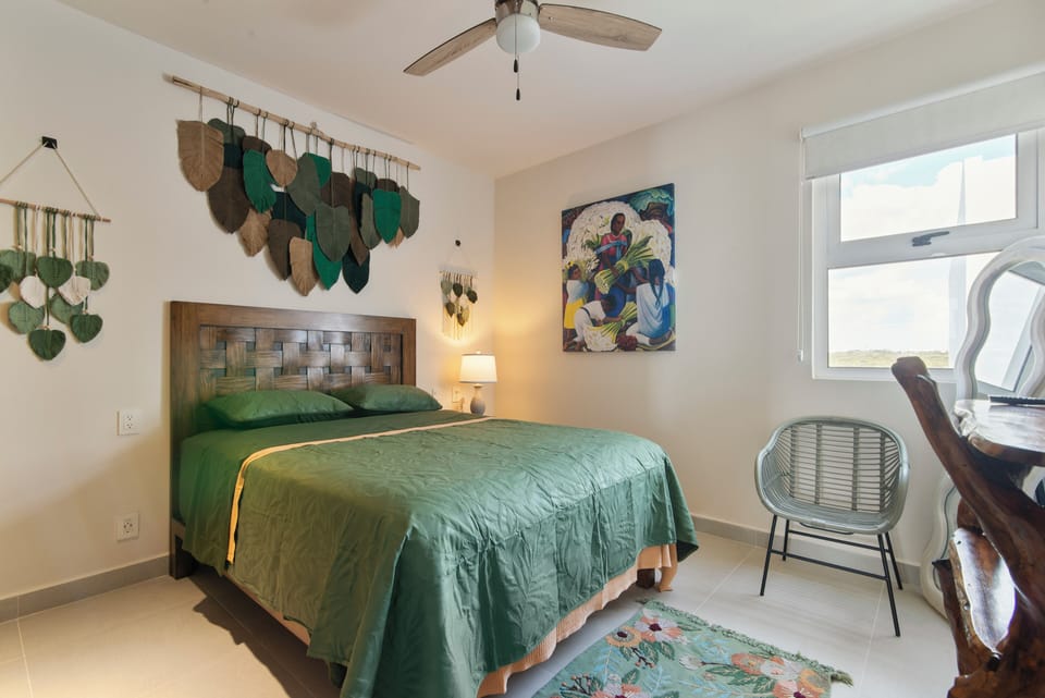 Guest bedroom with a queen bed