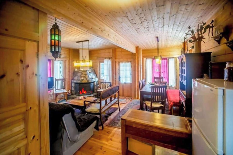 Classic wooden interior with traditional furniture and a welcoming atmosphere.