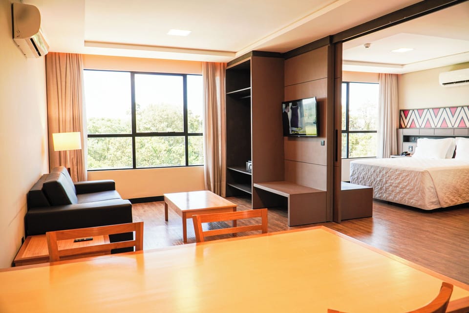 Unwind in a spacious suite with sunlit lounge areas.