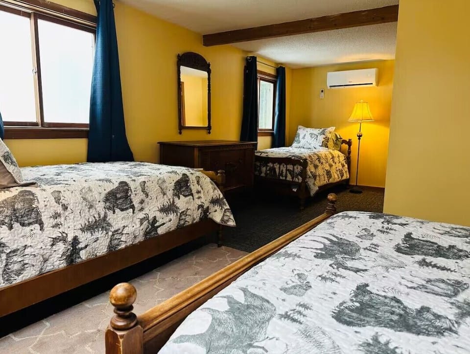 Bedroom 4 has a DOUBLE bed and 2 TWIN beds.