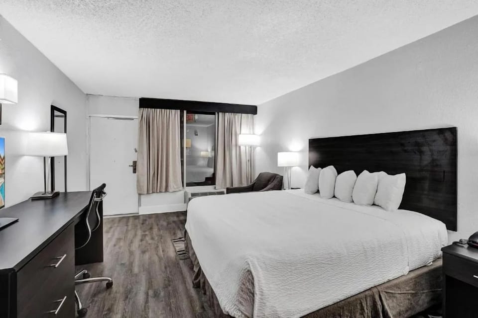 Stretch out on a plush king bed after a full day.