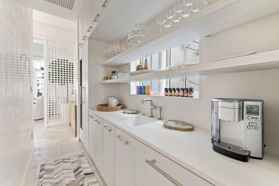 Start mornings with artisan coffee at the sleek beverage station.
