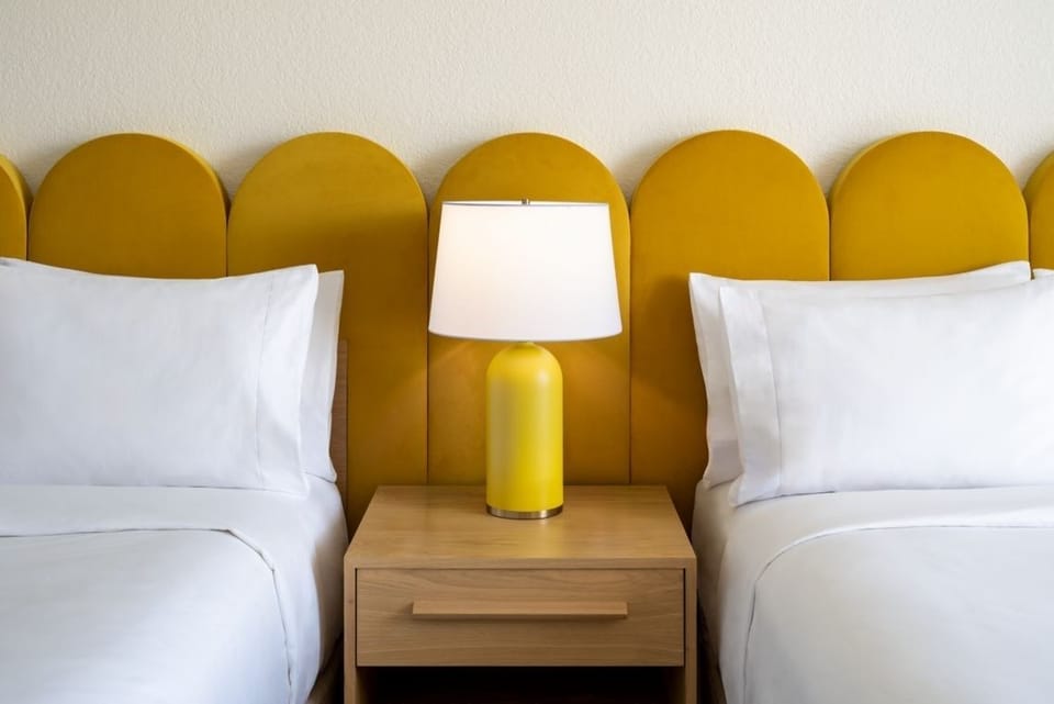 Unit with 2 Queen beds. Exact unit will be assigned upon arrival. Views, colors, and decor may vary.