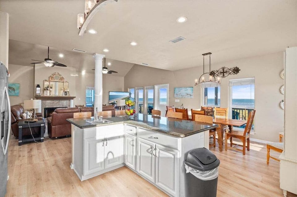 Kitchen island with seating, open to living room and perfect for gatherings