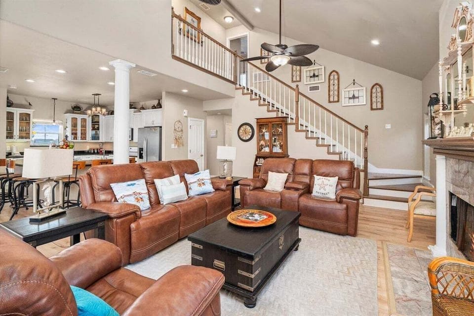 Open living and dining space with stylish seating and easy access to kitchen