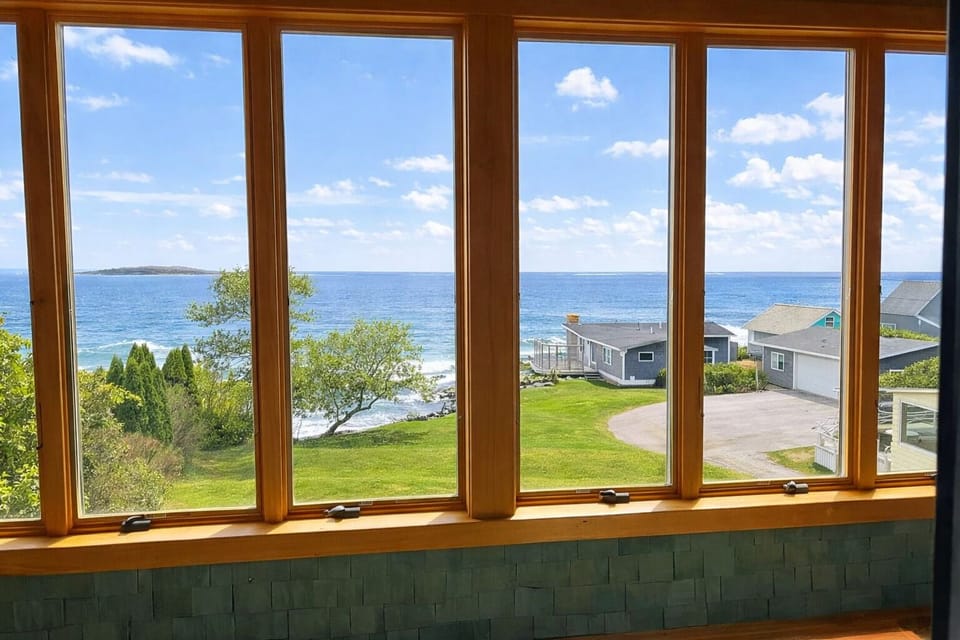 Second level sunroom with ocean views.