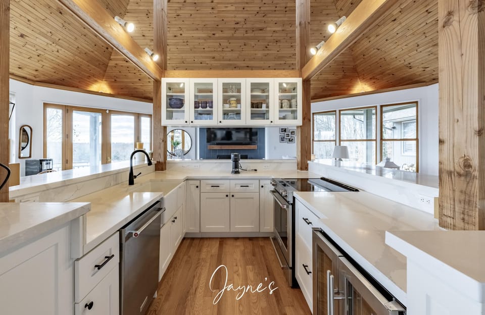 Bright, airy kitchen with vaulted ceilings and panoramic windows