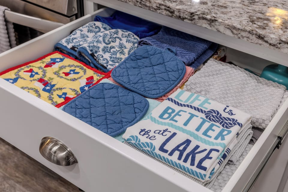 Modern, fully stocked kitchen with gorgeous lake views