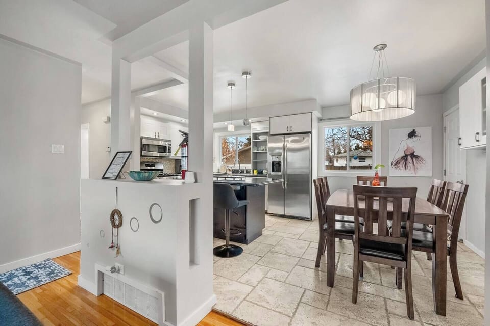 Full kitchen with a drip coffee maker, blender and an air fryer.
