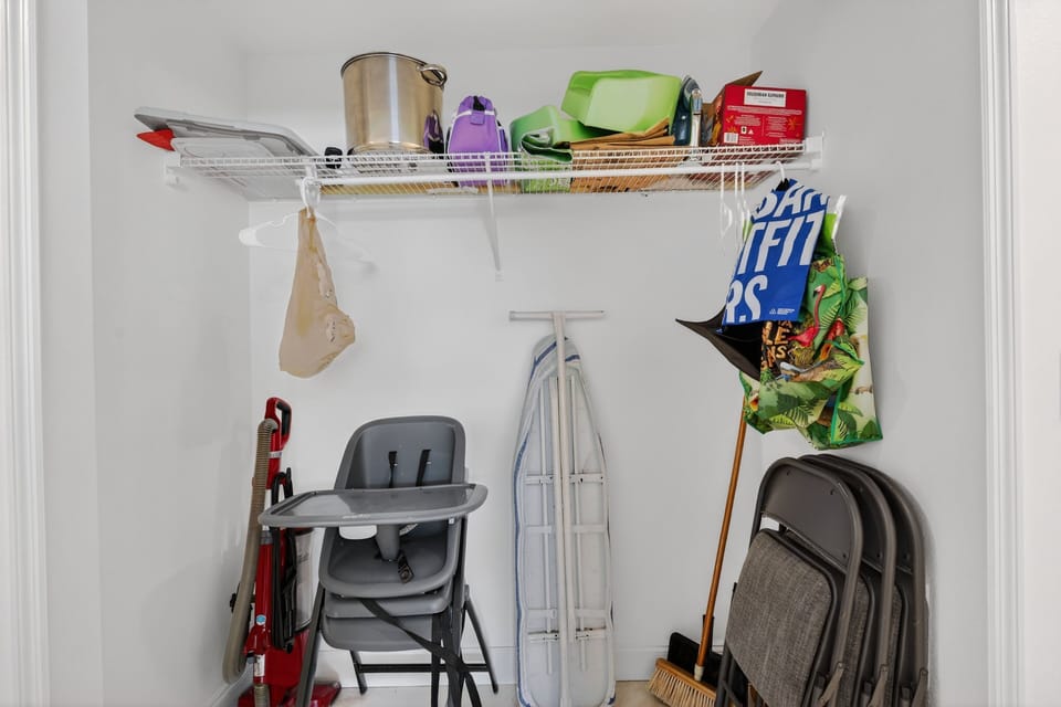 sweeper, highchair, folding chairs, ironing board, booster seats, broom/dustpan