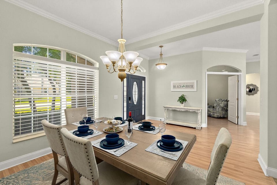 Spacious dining area with large windows and natural light