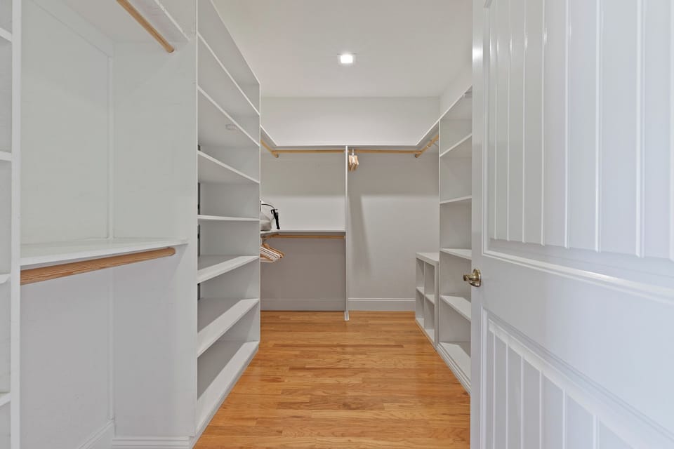 Oversized walk in master closet.