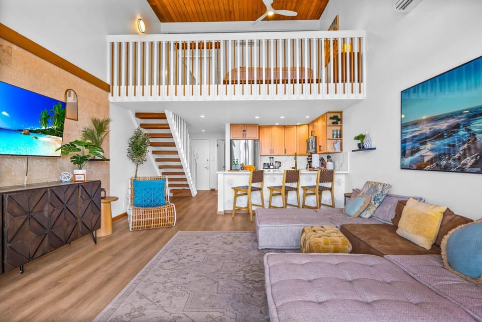 Stretch out on the sectional while the ocean view steals the show, with the lanai just steps away for fresh air.